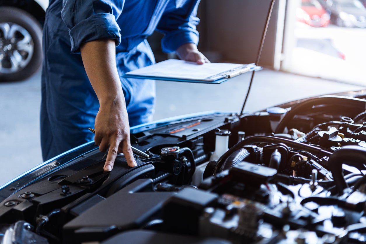 Gunn Chevrolet Technician inspecting vehicle